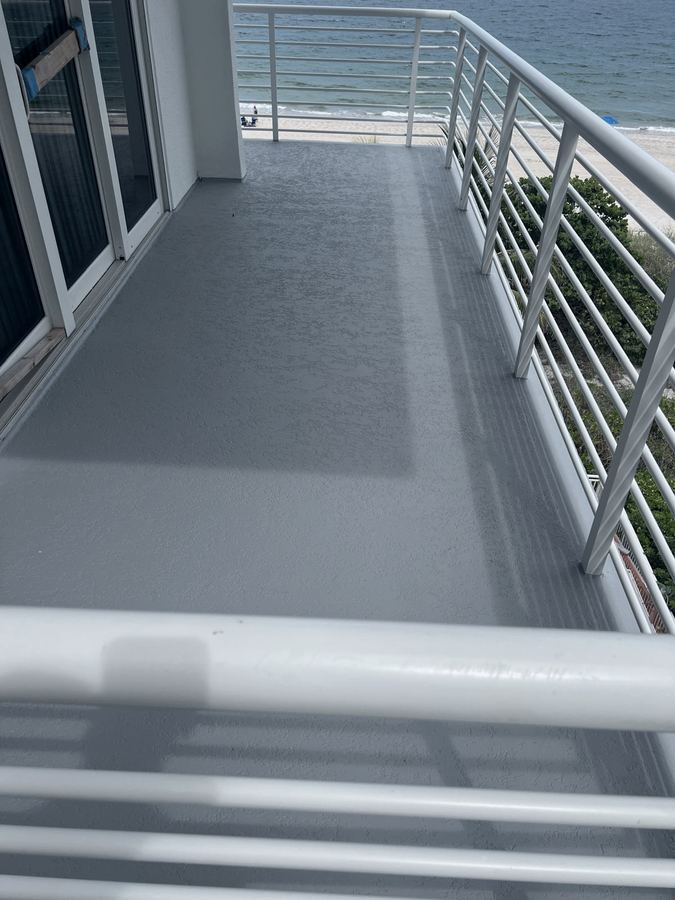 Freshly waterproofed oceanfront balcony deck coating