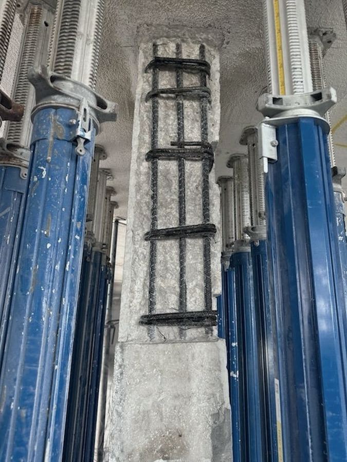 Corroded rebar cage exposed and prepped for concrete column repair