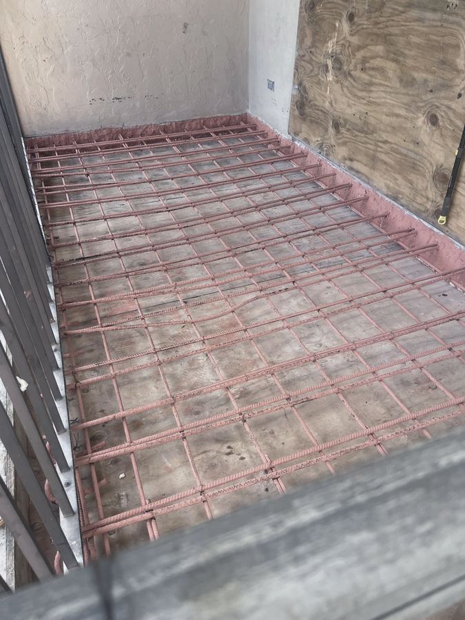 Reinforced deck prepared for new concrete placement