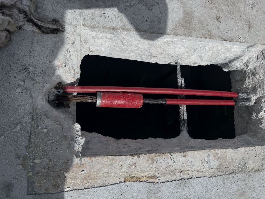 Epoxy injection ports set in a structural concrete repair