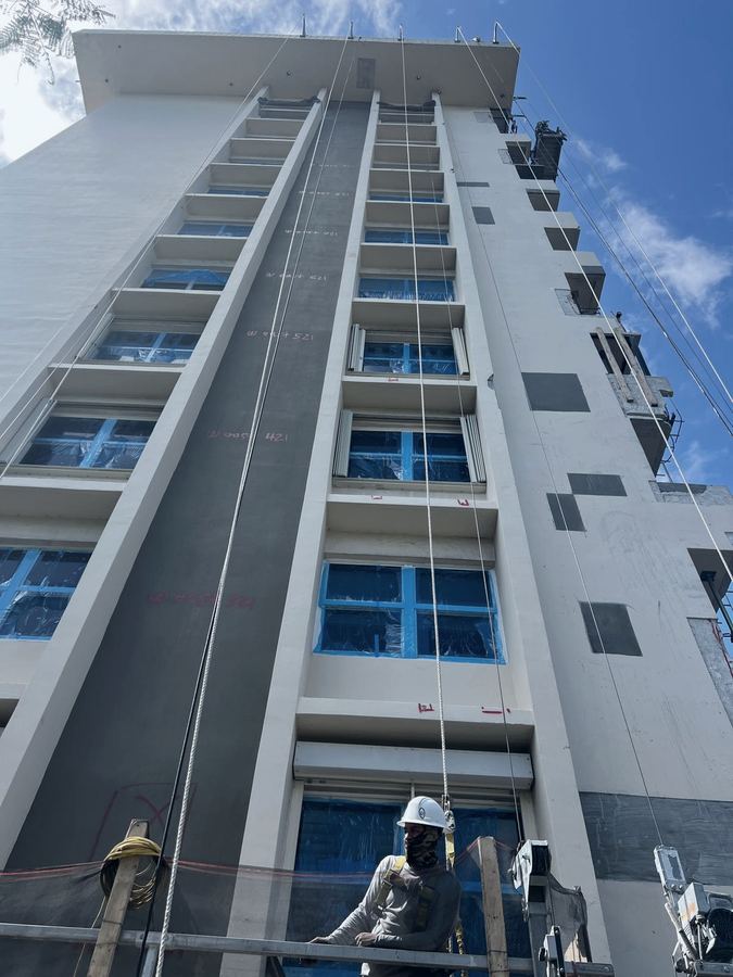 High-rise facade inspection and restoration for milestone recertification