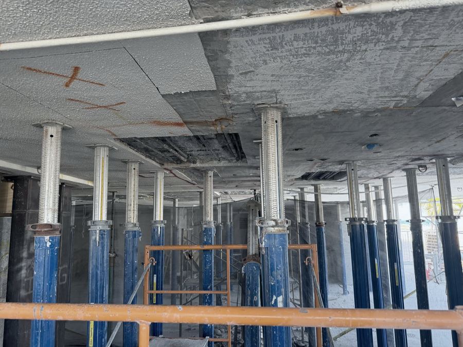Underside slab repair with shoring during concrete restoration