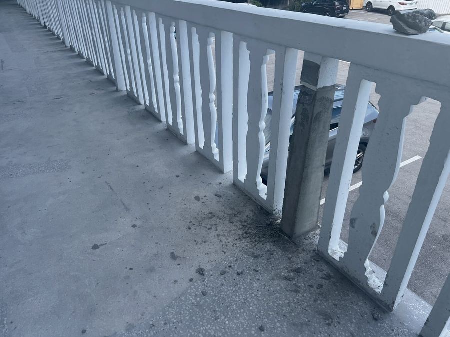 Damaged concrete railing and baluster identified for repair